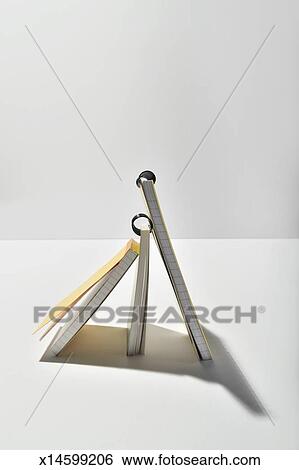 Stock Image - Three memo pads stand. Fotosearch - Search Stock Photography, Poster Photos, Pictures, and Photo Clip Art