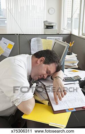 Overworked Business Man Asleep On Desk Stock Image X75306311