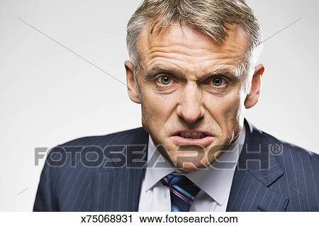 Portrait Of Grey Haired Man In A Suit Stock Image X75068931