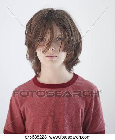 Caucasian Boy With Long Hair Stock Photo X75638228 Fotosearch