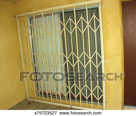 Security Gate Across Sliding Glass Door Stock Photo X75723527