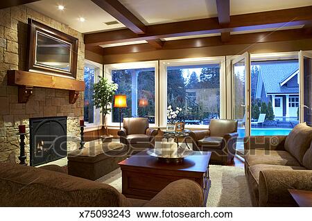 Living Room With Wood Beams On Ceiling And Fireplace Stock Image