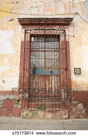 French Doors And Wrought Iron In Old Adobe Wall Picture