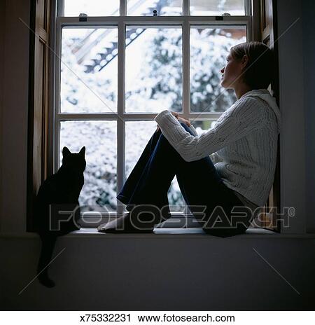 Young Woman Sitting In Window With Cat Looking Outside Side View Stock Image Young Woman Sitting In Window With Cat Looking Outside Side View