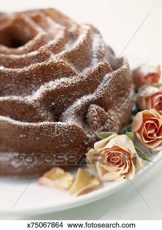 Bundt Cake Decorated With Roses Picture X75067864 Fotosearch
