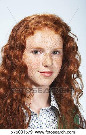 Teenage Girl 13 15 With Curly Hair And Freckles Portrait Stock