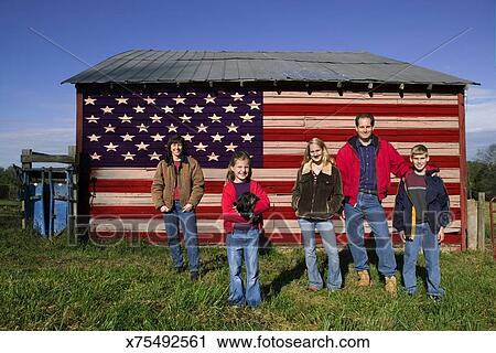 Family By Barn With American Flag Stock Image X75492561 Fotosearch