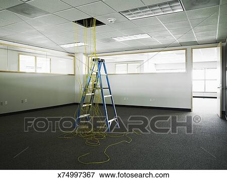 Ethernet Cables Hanging From Ceiling Of Office Stock Photo