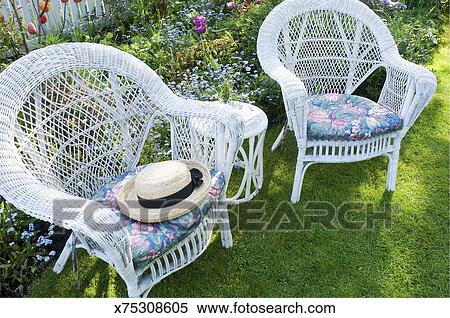 White Wicker Garden Furniture Stock Photography X75308605