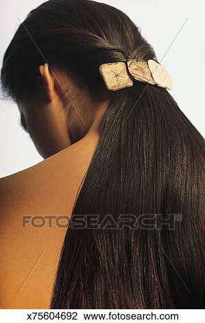 Back View Of Woman With Long Hair In Ponytail Stock Image