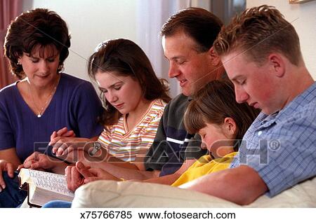 Family Praying Together Stock Photography x75766785