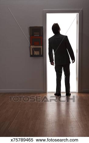 Man Walking Through Door Stock Photography X75789465 Fotosearch