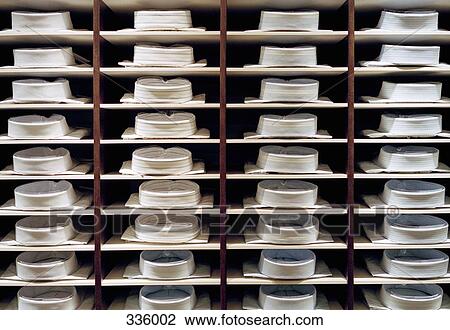 Folded shirts on clothes rack View Large Photo Image Stock Image - Folded shirts on clothes rack. Fotosearch