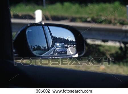 Traffic jam on highway seen in rear-view mirror View Large Photo Image Stock Image - Traffic jam on highway seen in rear-view mirror. Fotosearch