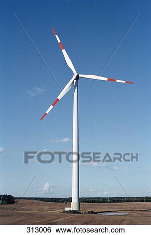 Wind turbine in field View Large Photo Image Stock Photograph - Wind turbine in field. Fotosearch