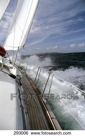 Yacht sailing in rough seas View Large Photo Image Stock Photograph - Yacht sailing in rough seas. Fotosearch