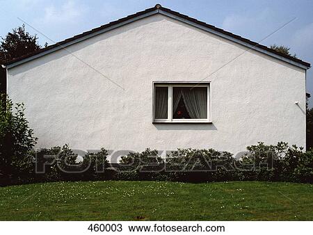 Side facade of a white suburban house View Large Photo Image Stock Image - Side facade of a white suburban house. Fotosearch