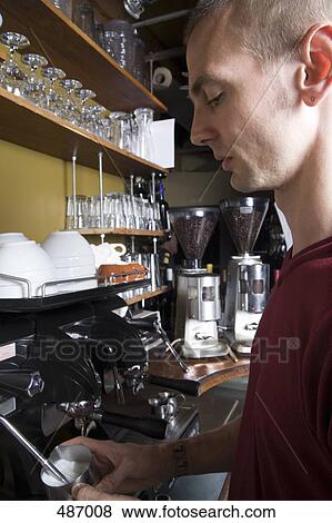 Barista frothing milk View Large Photo Image Stock Photo - Barista frothing milk. Fotosearch