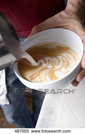 Stock Image - Making a Latte. Fotosearch