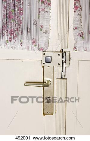 Stock Image - Detail of a back door. Fotosearch