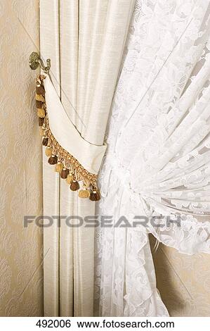 Detail of curtains drawn back View Large Photo Image Stock Photograph - Detail of curtains drawn back. Fotosearch