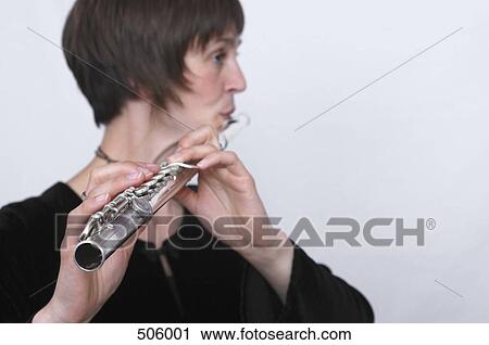 A female flautist View Large Photo Image Stock Image - A female flautist. Fotosearch