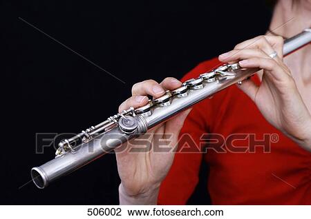 A female flautist View Large Photo Image Stock Image - A female flautist. Fotosearch