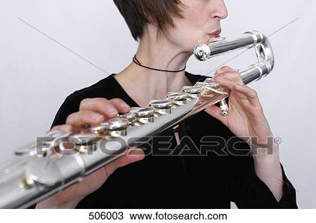 A female flautist View Large Photo Image Stock Image - A female flautist. Fotosearch