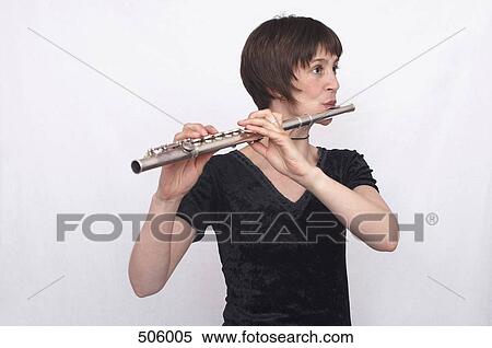 Stock Photography - A female flautist. Fotosearch