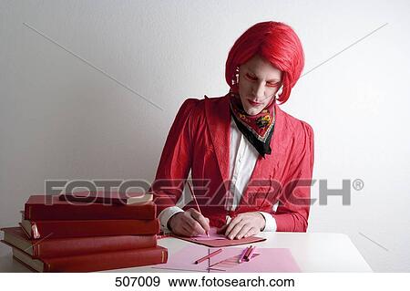 Drag queen sitting at desk View Large Photo Image Stock Photo - Drag queen sitting at desk. Fotosearch