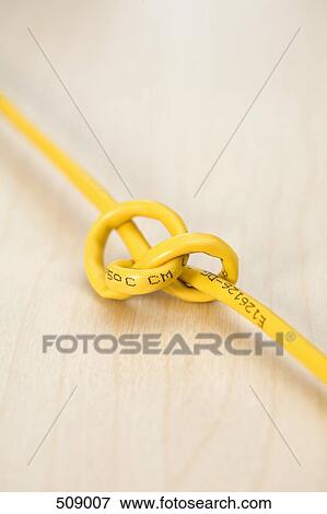 A knotted network connection cable View Large Photo Image Stock Photo - A knotted network connection cable. Fotosearch
