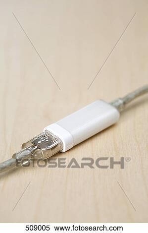 Stock Photography - USB cable connected to an extension cord. Fotosearch