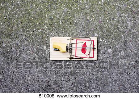 A missing bite from the cheese in a mousetrap View Large Photo Image Stock Photo - A missing bite from the cheese in a mousetrap. Fotosearch