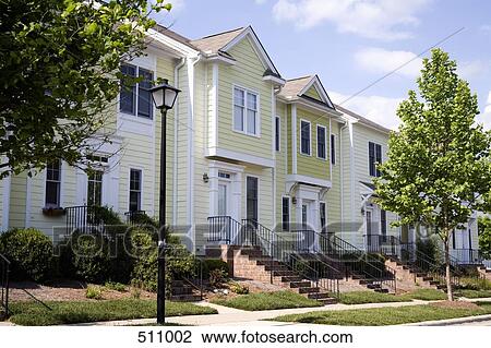 Townhouses on a residential street View Large Photo Image Stock Image - Townhouses on a residential street. Fotosearch