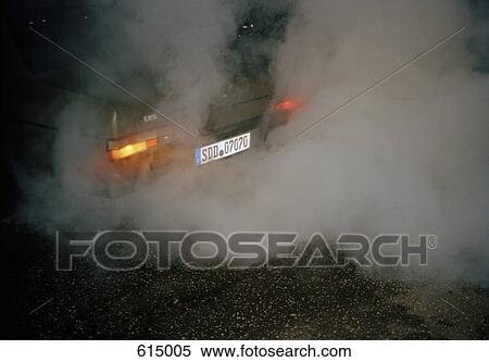 A car emitting fumes View Large Photo Image Stock Photography - A car emitting fumes. Fotosearch