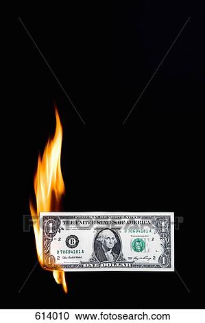 A dollar bill on fire View Large Photo Image Stock Image - A dollar bill on fire. Fotosearch