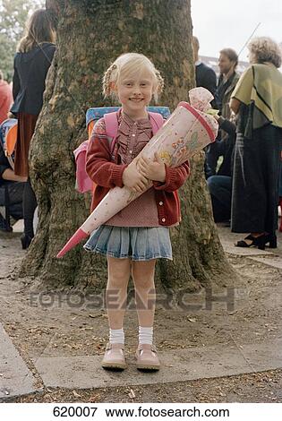 A girl on her first day of school View Large Photo Image Stock Photo - A girl on her first day of school. Fotosearch