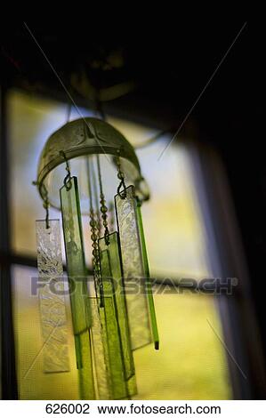 Stock Image - A glass wind chime. Fotosearch