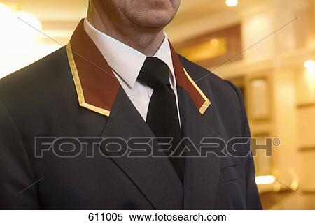 A man wearing a suit View Large Photo Image Stock Photography - A man wearing a suit. Fotosearch