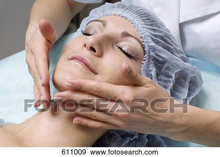 A nurse preparing a woman for a medical examination View Large Photo Image Stock Photo - A nurse preparing a woman for a medical examination. Fotosearch