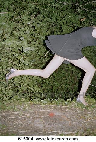 A woman running View Large Photo Image Picture - A woman running. Fotosearch