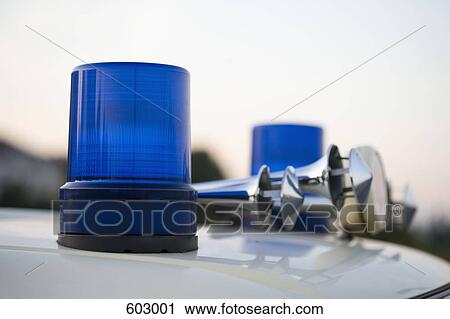 Blue lights and car horns on the roof of a police vehicle View Large Photo Image Stock Image - Blue lights and car horns on the roof of a police vehicle. Fotosearch