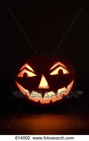 Illuminated Halloween pumpkin View Large Photo Image Stock Image - Illuminated Halloween pumpkin. Fotosearch