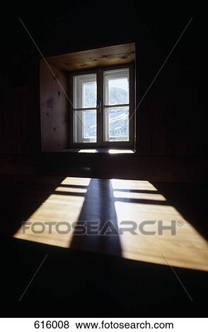 Sunlight shining through a window View Large Photo Image Stock Photo - Sunlight shining through a window. Fotosearch