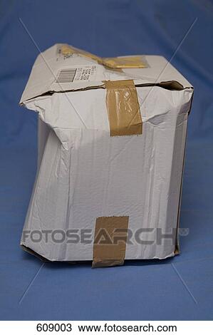 Stock Image - A crushed cardboard box. Fotosearch