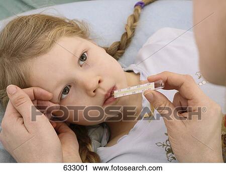 A human hand holding a thermometer in a young girl’s mouth View Large Photo Image Stock Image - A human hand holding a thermometer in a young girl’s mouth. Fotosearch