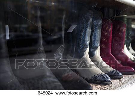 A row of cowboy boots View Large Photo Image Picture - A row of cowboy boots. Fotosearch