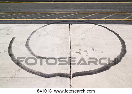 A single tire track in a spiral shape View Large Photo Image Stock Image - A single tire track in a spiral shape. Fotosearch