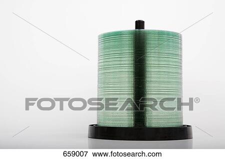 A stack of compact discs on a spool View Large Photo Image Stock Photo - A stack of compact discs on a spool. Fotosearch