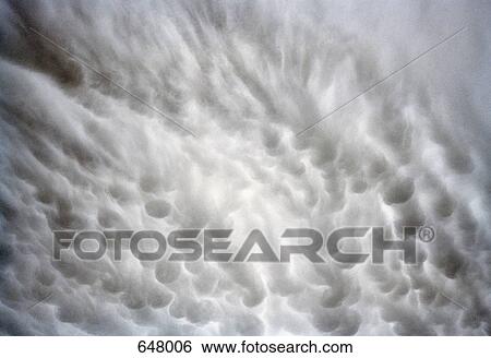 Stock Photograph - Cirrocumulus cloudscape. Fotosearch